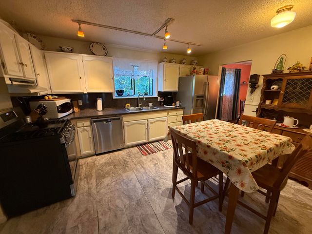 7036 W Woodlea Road, Oscoda, MI 48750