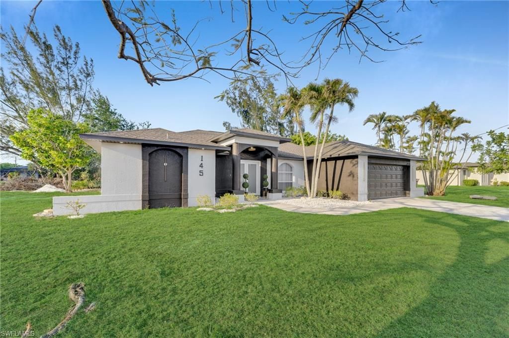 145 SE 17th ST, CAPE CORAL, FL 33990 — photo 2