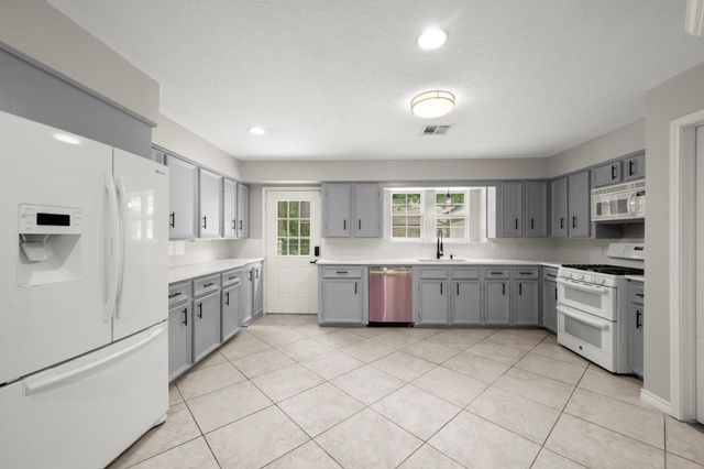 2418 Pebble Lake Drive, Magnolia, TX 77354