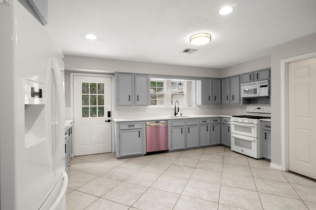 2418 Pebble Lake Drive, Magnolia, TX 77354
