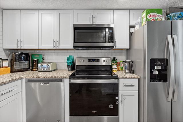 1146 KING ARTHUR COURT 110, Dunedin, FL 34698