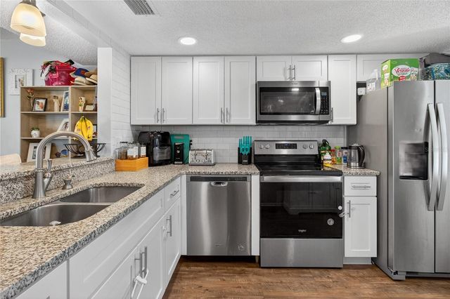 1146 KING ARTHUR COURT 110, Dunedin, FL 34698