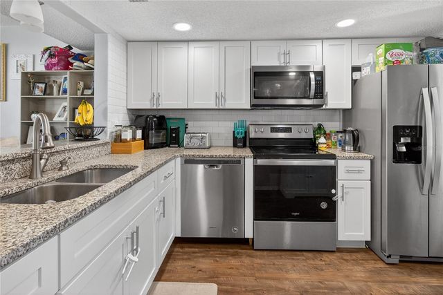 1146 KING ARTHUR COURT 110, Dunedin, FL 34698