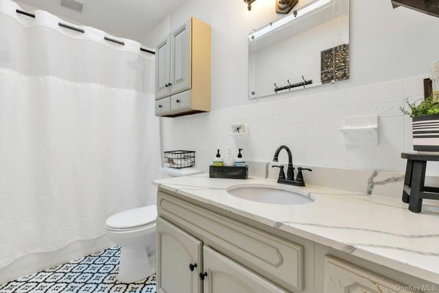 1295 Wilson Place, West Islip, NY 11795