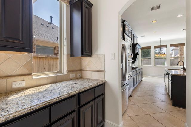 11210 Spoke Hollow Creek Lane, Cypress, TX 77433