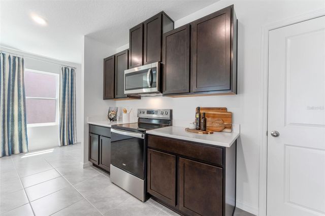7181 BROAD RIVER AVENUE, Land O Lakes, FL 34638