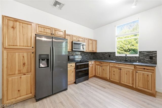 6011 Sea Grass LN, Naples, FL 34116