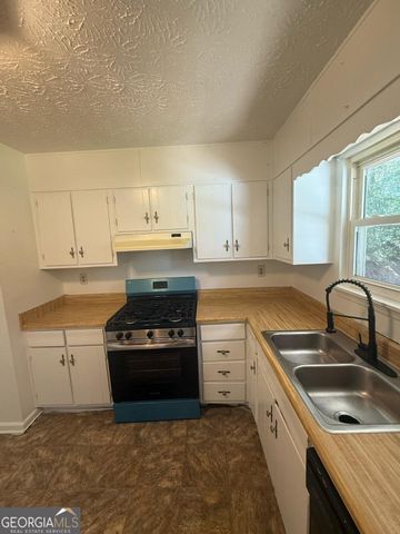 4967 Comanche Court NW, Lilburn, GA 30047