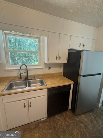 4967 Comanche Court NW, Lilburn, GA 30047
