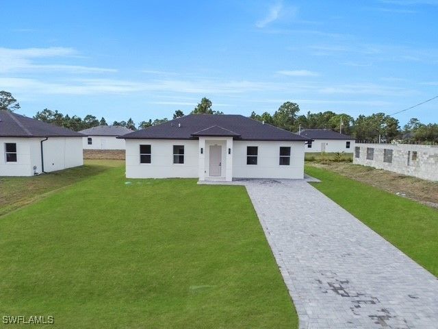 708 PEACOCK AVE, Lehigh Acres, FL 33974
