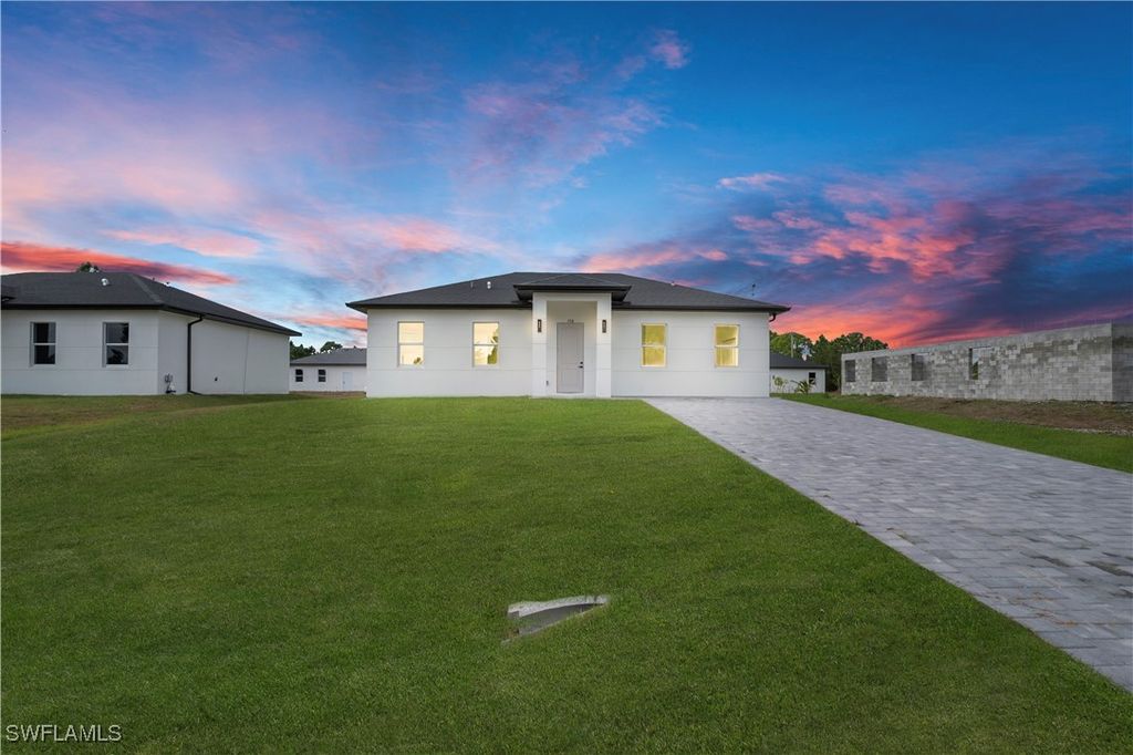 708 PEACOCK AVE, Lehigh Acres, FL 33974