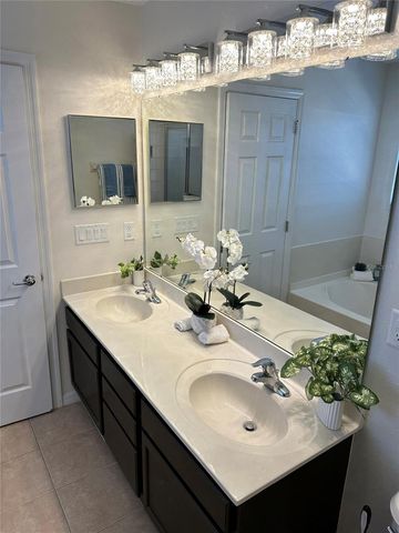 9189 CAMDEN GARDENS STREET, Orlando, FL 32827