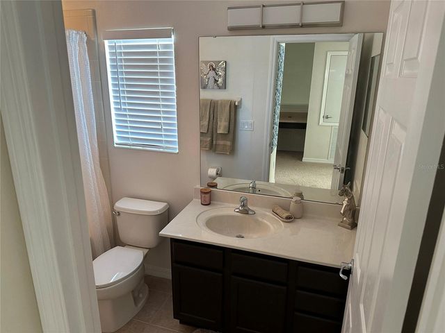 9189 CAMDEN GARDENS STREET, Orlando, FL 32827