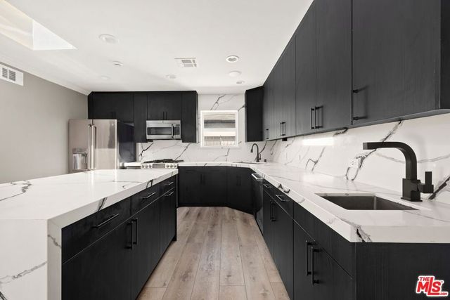 2011 Stearns Drive, Los Angeles, CA 90034