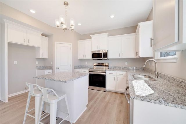 611 Wild Lupine Lane, Raymore, MO 64083