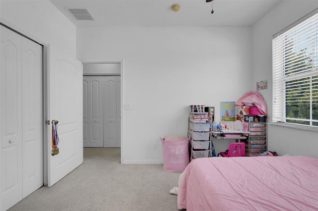 9408 FLOWERING COTTONWOOD ROAD, Orlando, FL 32832