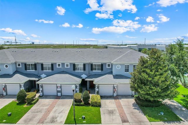9408 FLOWERING COTTONWOOD ROAD, Orlando, FL 32832