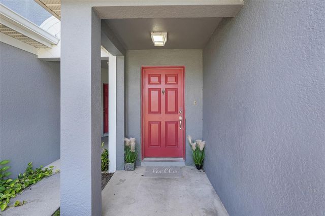 9408 FLOWERING COTTONWOOD ROAD, Orlando, FL 32832