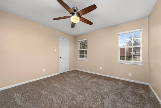 7722 12th Fairway Lane, Humble, TX 77346