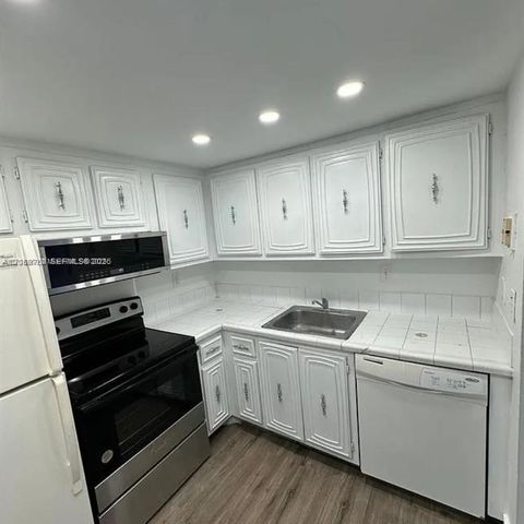 492 NW 165th St Road C-415, Miami, FL 33169