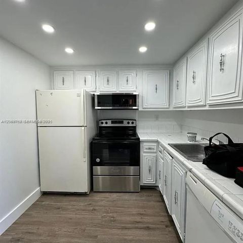 492 NW 165th St Road C-415, Miami, FL 33169