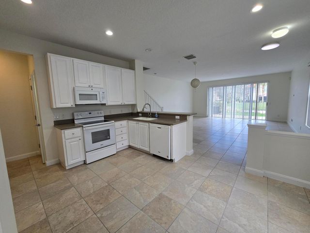 1111 Pinewood Lake Court, Greenacres, FL 33415