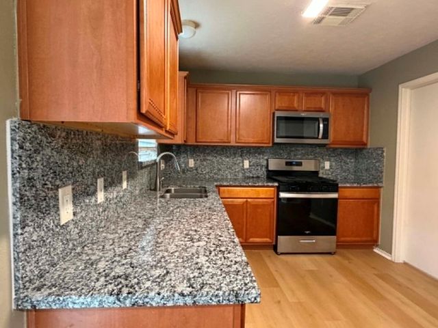 11030 Knobbley Oak Court, Houston, TX 77065
