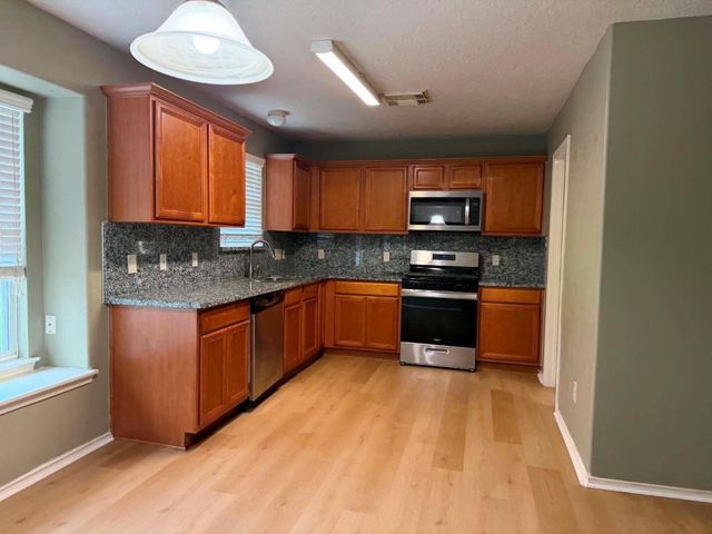 11030 Knobbley Oak Court, Houston, TX 77065