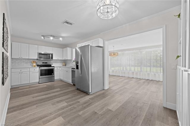 1051 Cypress Woods DR, Naples, FL 34103