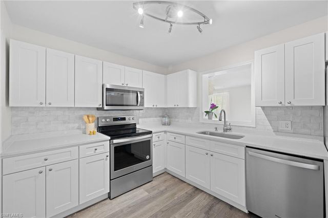 1051 Cypress Woods DR, Naples, FL 34103