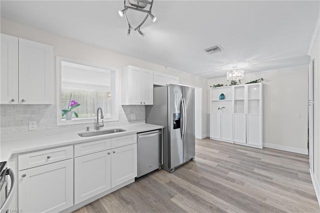 1051 Cypress Woods DR, Naples, FL 34103
