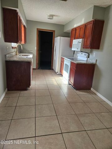 8256 JUSTIN Road N, Jacksonville, FL 32210