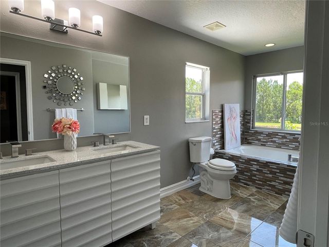 5036 WHISTLING PINES COURT, Wesley Chapel, FL 33545