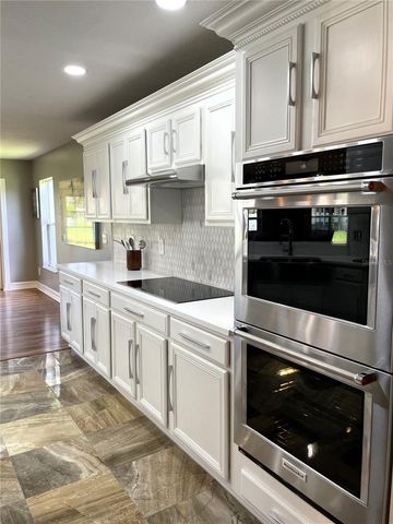 5036 WHISTLING PINES COURT, Wesley Chapel, FL 33545