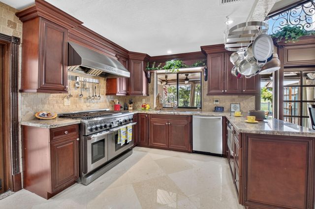 663 DEER CREEK HOLLOWS Circle, Deerfield Beach, FL 33442