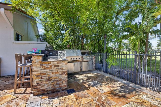 663 DEER CREEK HOLLOWS Circle, Deerfield Beach, FL 33442