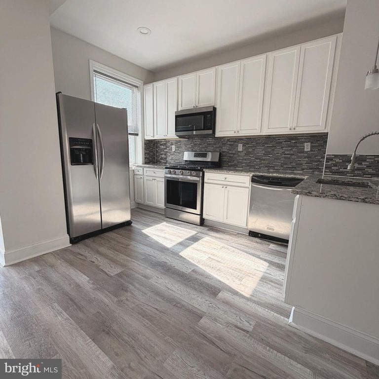 Image 4 of property listing at 2631 W COLD SPRING LN, Baltimore, MD 21215