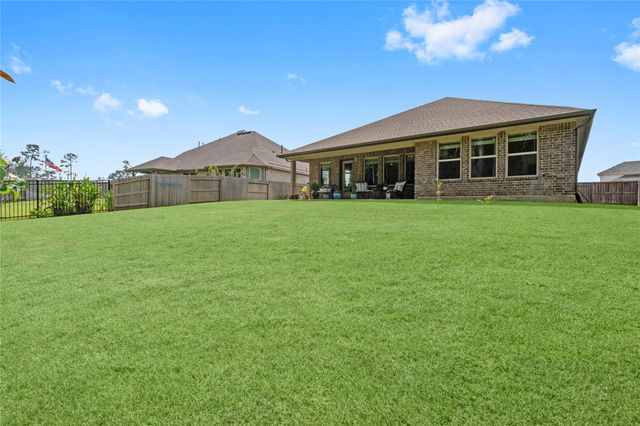 725 Ivory Creek Court, Willis, TX 77378