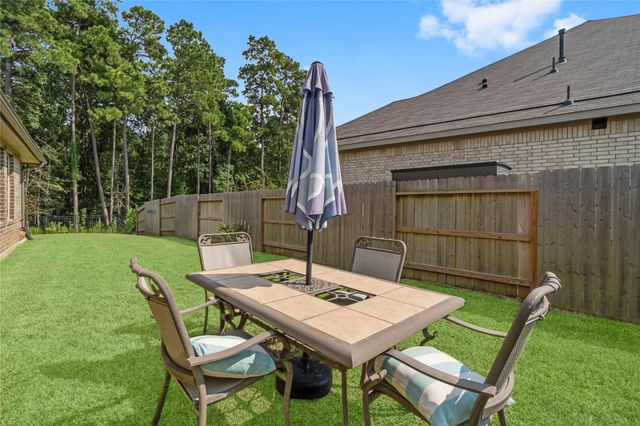 725 Ivory Creek Court, Willis, TX 77378