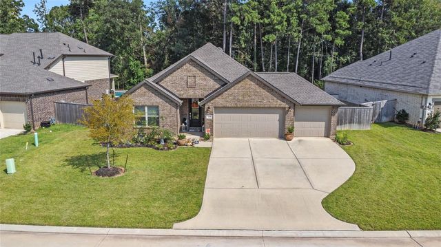 725 Ivory Creek Court, Willis, TX 77378