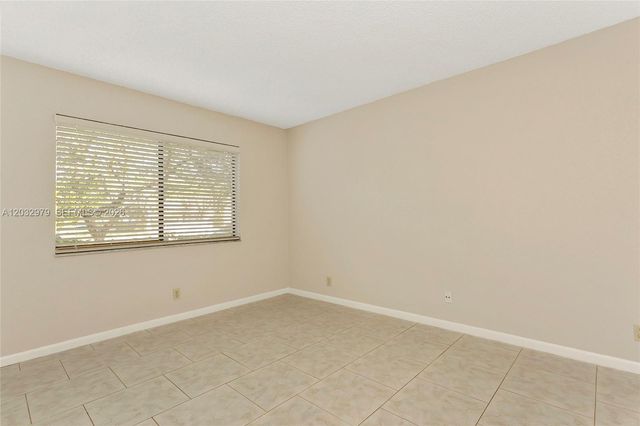 300 Racquet Club Road 104, Weston, FL 33326