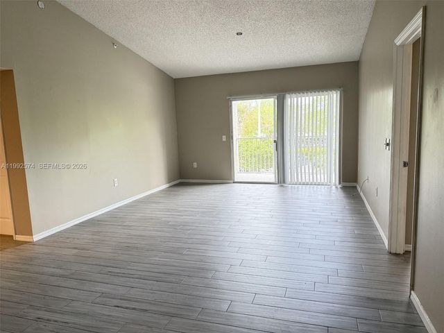 5015 Wiles Rd 207, Coconut Creek, FL 33073