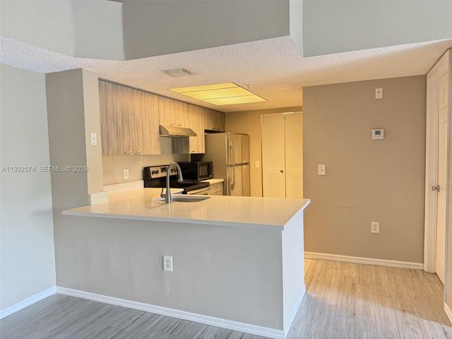 5015 Wiles Rd 207, Coconut Creek, FL 33073