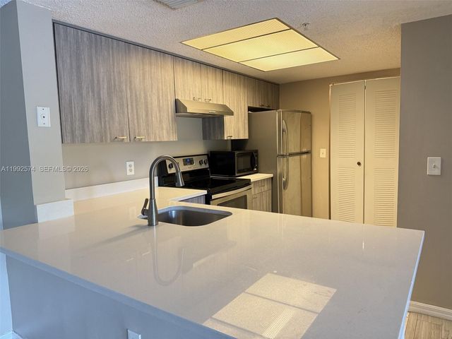 5015 Wiles Rd 207, Coconut Creek, FL 33073