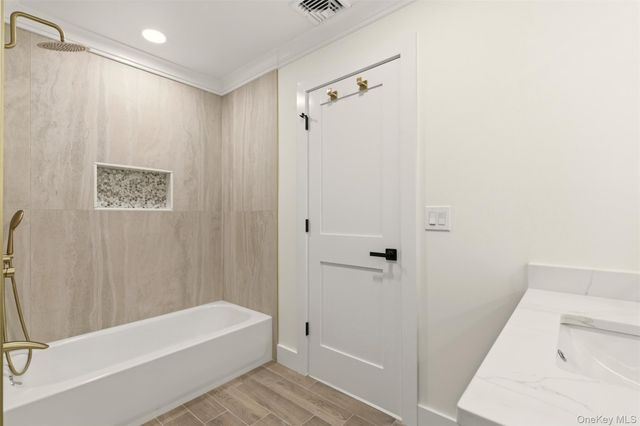 11 Plantation Drive, Hauppauge, NY 11788