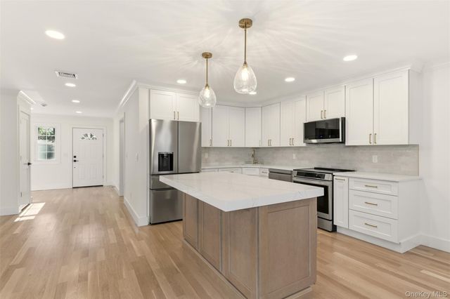 11 Plantation Drive, Hauppauge, NY 11788