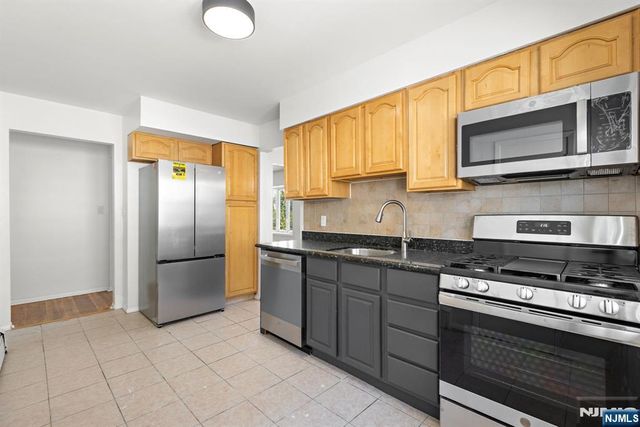 54 W Columbia Avenue, Palisades Park, NJ 07650