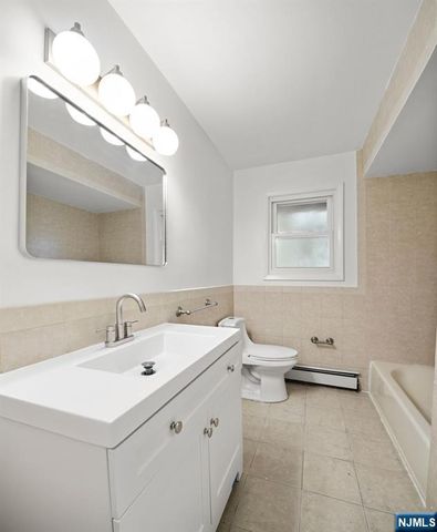 54 W Columbia Avenue, Palisades Park, NJ 07650