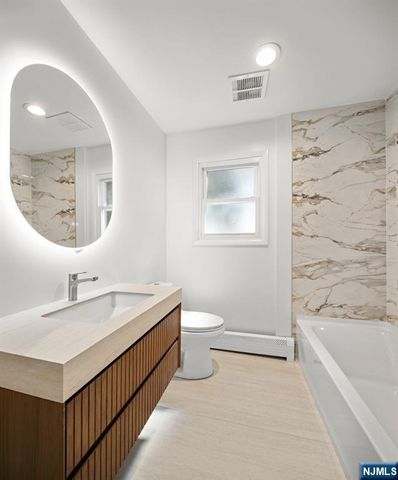 54 W Columbia Avenue, Palisades Park, NJ 07650