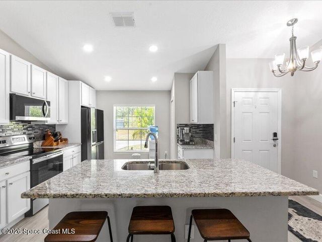 587 Plumbago Road NW, Palm Bay, FL 32907